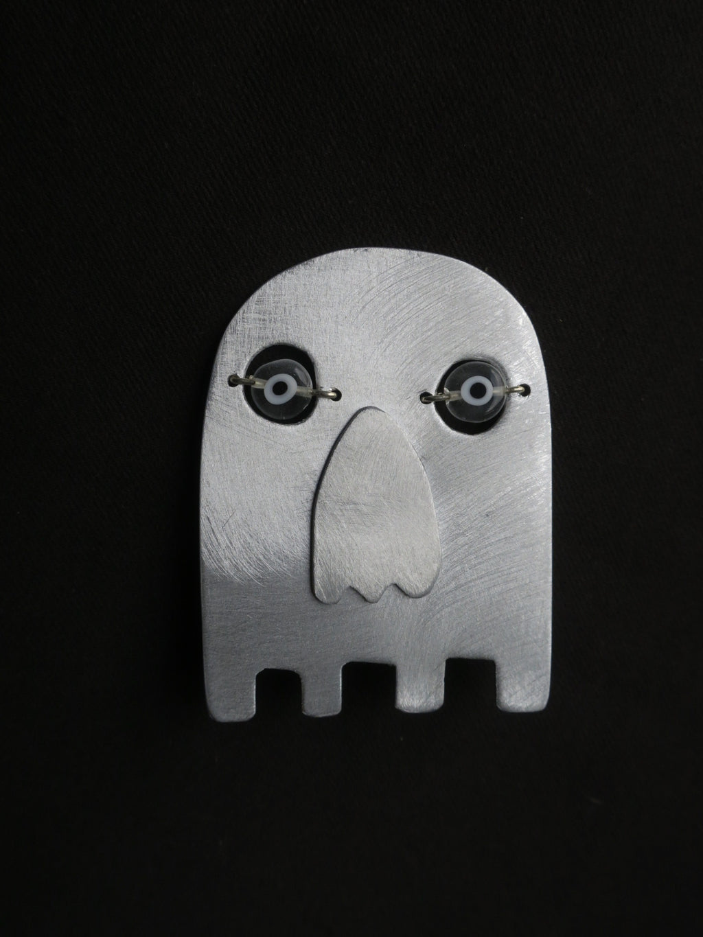 La muerte - Broche aristanale en aluminium.