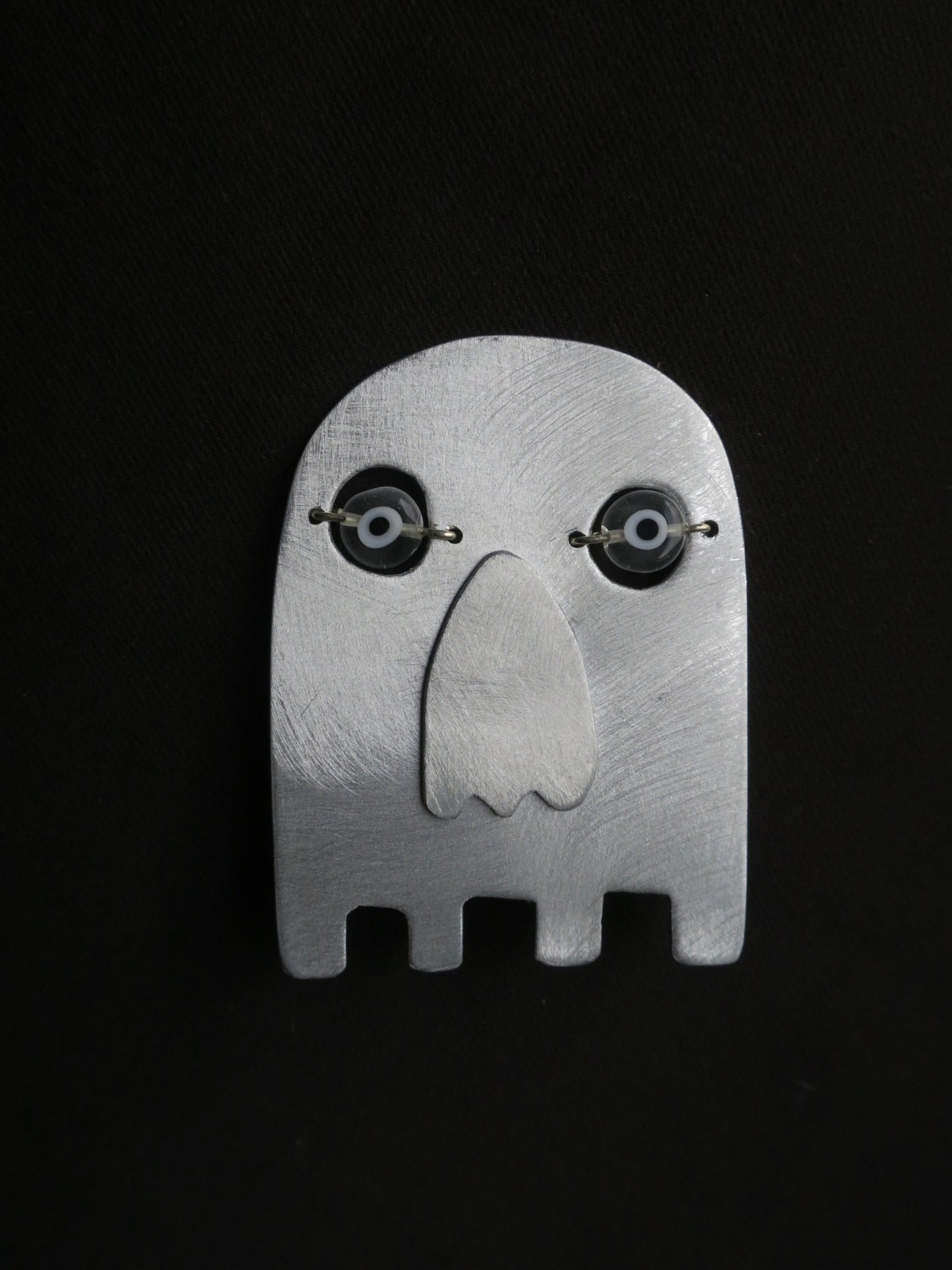 La muerte - Broche aristanale en aluminium.