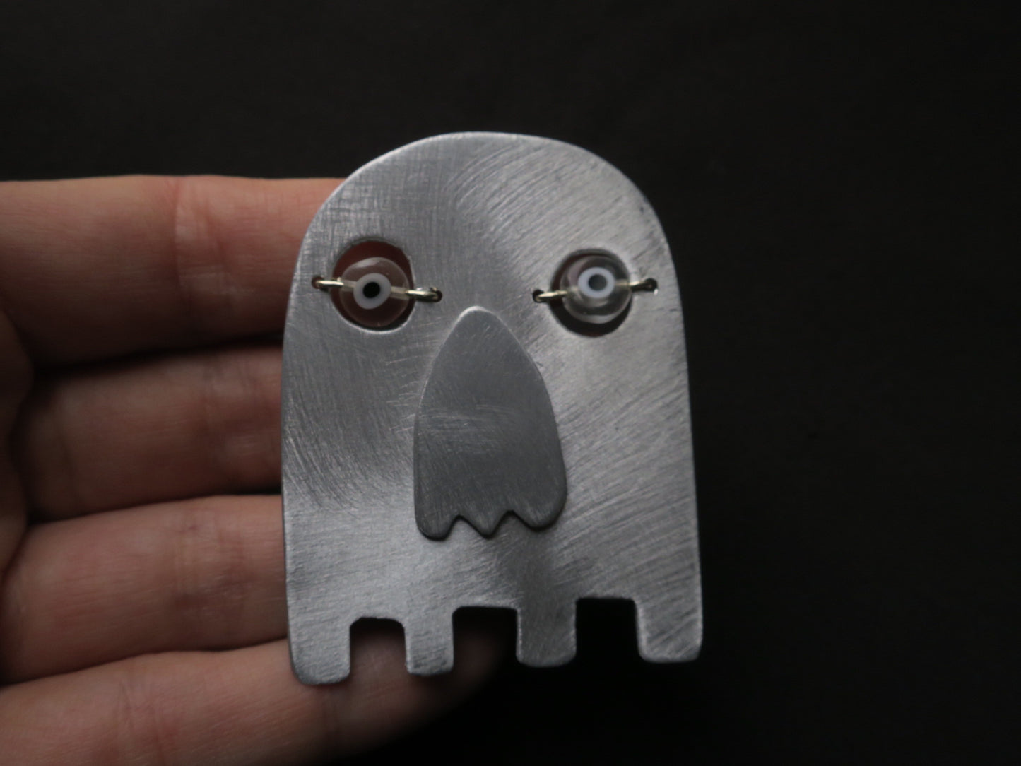 La muerte - Broche aristanale en aluminium.